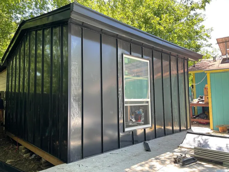 Black standing seam metal wall panels for Roof Inspection in West Haverstraw